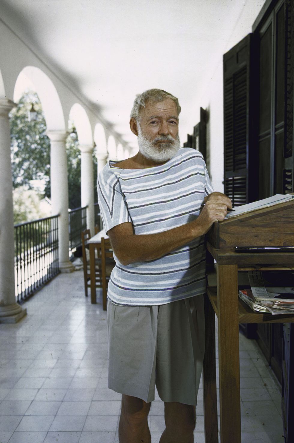 Ernest Hemingway at the standing desk on the balcony of the house near Malaga