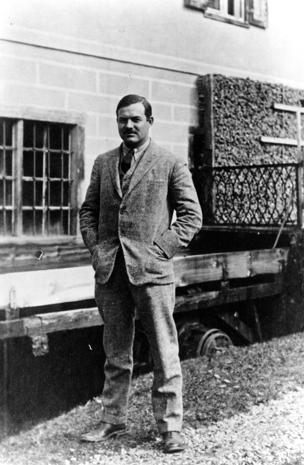 Ernest Hemingway in the courtyard of his house in Paris